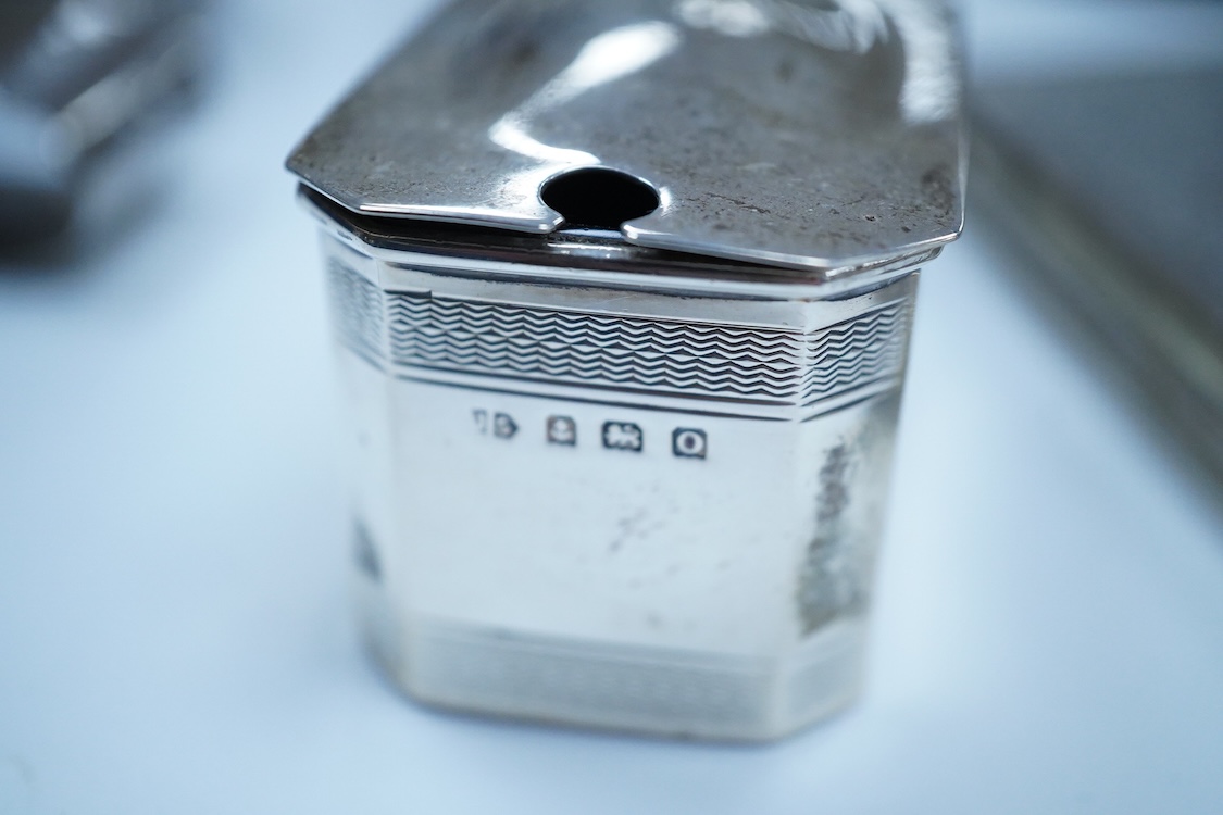 A small group of silver to include an Elizabeth II pierced shallow dish by Viners Ltd, Sheffield, 1957, diameter 12.4cm, a 1930's silver mounted cigarette box, a George III silver fiddle pattern sauce ladle and five silv